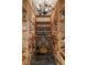 Spacious wine cellar with custom wood racking for ample bottle storage and display at 92 Old Ivy Ne Rd # 6, Atlanta, GA 30342
