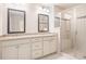 Bathroom with double sinks, vanity, and glass shower at 252 Stone Park Dr, Woodstock, GA 30188