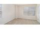 Well-lit bedroom with neutral carpet, two windows with blinds, and ample natural light at 252 Stone Park Dr, Woodstock, GA 30188