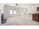 Bright living room with fireplace, multiple windows, and lots of space at 252 Stone Park Dr, Woodstock, GA 30188