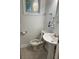 Bathroom features a pedestal sink and a window at 2620 Northview Ave, Decatur, GA 30032