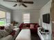 Cozy living room featuring natural light, comfortable seating, and ceiling fan at 2620 Northview Ave, Decatur, GA 30032
