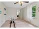 Bedroom with exercise equipment, open doorway, natural light, and views to outside at 2965 Village Dr, Marietta, GA 30062