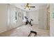 Versatile bedroom space with exercise equipment, lots of natural light, and multiple doorways at 2965 Village Dr, Marietta, GA 30062