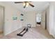 Adaptable room with exercise equipment and a doorway view to a connected living area, filled with light at 2965 Village Dr, Marietta, GA 30062