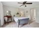 Charming bedroom with cozy decor and a workspace, enhanced by natural light and calming ambiance at 2965 Village Dr, Marietta, GA 30062