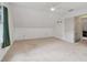 A bright bonus room with carpeted floors, neutral walls, and a fan for added comfort at 2965 Village Dr, Marietta, GA 30062