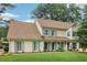 Inviting two-story home with manicured lawn, classic shutters, and a welcoming entrance at 2965 Village Dr, Marietta, GA 30062