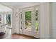 Bright and airy home featuring a glass front door with sidelights and a view to the outdoor space at 2965 Village Dr, Marietta, GA 30062