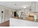 Modern kitchen featuring stainless steel appliances, granite countertops, and white cabinets at 2965 Village Dr, Marietta, GA 30062