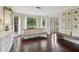 Cozy living room featuring hardwood floors, large windows, and bench seating at 2965 Village Dr, Marietta, GA 30062