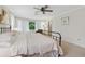 Comfortable main bedroom featuring natural light and a neutral color palette, perfect for relaxation and rest at 2965 Village Dr, Marietta, GA 30062