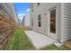 Home's backyard showing the lawn and concrete patio at 706 Smokey Quartz Way, Kennesaw, GA 30144