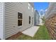 This house's backyard featuring a concrete patio and an outdoor view at 706 Smokey Quartz Way, Kennesaw, GA 30144