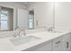 Bright bathroom featuring a double sink vanity with chrome faucets and handles at 706 Smokey Quartz Way, Kennesaw, GA 30144