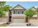 Charming townhome featuring a well-maintained yard and appealing facade at 146 Sunset Ln, Woodstock, GA 30189