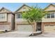 Charming townhome showcasing manicured landscaping and stone accents at 146 Sunset Ln, Woodstock, GA 30189