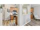 Cozy kitchen area boasts stainless steel appliances, ample cabinet space, and modern flooring at 146 Sunset Ln, Woodstock, GA 30189