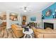 Inviting living room featuring a fireplace, modern decor, and an open floor plan at 146 Sunset Ln, Woodstock, GA 30189