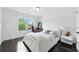 Bedroom with a backyard view and modern design at 2532 Gloster Mill Drive Southwest, Lawrenceville, GA 30044