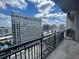 Balcony view overlooking a sprawling cityscape on a partly cloudy day at 3040 Peachtree Nw Rd # 1713, Atlanta, GA 30305