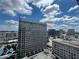 Partly cloudy day highlighting city buildings in a captivating skyline view at 3040 Peachtree Nw Rd # 1713, Atlanta, GA 30305