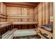 Relaxing sauna room featuring wood paneling and benches to rejuvenate after a workout at 3040 Peachtree Nw Rd # 1713, Atlanta, GA 30305