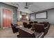 Home theater room with comfortable seating, a large screen, and a projector for an immersive experience at 3040 Peachtree Nw Rd # 1713, Atlanta, GA 30305