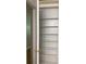 Bedroom closet includes built-in shelves, a door, and neutral colored walls at 3604 Orchard Cir, Decatur, GA 30032