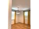 Bright dining area with gleaming hardwood floors, bright windows, and modern lighting at 3604 Orchard Cir, Decatur, GA 30032