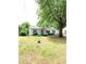 Traditional single-story home with a cozy front porch, painted shutters and a mature shade tree at 3604 Orchard Cir, Decatur, GA 30032