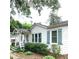 Well-maintained home exterior featuring a cozy front porch and neatly landscaped garden, painted shutters at 3604 Orchard Cir, Decatur, GA 30032