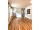 Cozy living room with hardwood floors, neutral walls, and doorway access to other rooms at 3604 Orchard Cir, Decatur, GA 30032