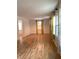 Spacious living room with gleaming hardwood floors, bright windows, and neutral decor at 3604 Orchard Cir, Decatur, GA 30032
