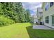 Large backyard with a well-manicured lawn and space for recreation at 513 Shadow Valley Ct, Lithonia, GA 30058