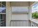 View from a second story balcony looking out to the neighborhood at 513 Shadow Valley Ct, Lithonia, GA 30058