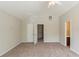 Bedroom with vaulted ceilings and an ensuite bathroom and closet at 513 Shadow Valley Ct, Lithonia, GA 30058