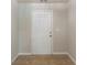 Mud Room with a door and tile flooring at 513 Shadow Valley Ct, Lithonia, GA 30058