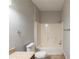 Cozy bathroom featuring a shower-tub combo with gray walls at 5341 Terrytown Ln, Lithonia, GA 30038