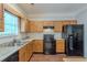 Modern kitchen featuring granite countertops and stainless steel appliances at 5341 Terrytown Ln, Lithonia, GA 30038