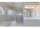 Bathroom with a jacuzzi tub, shower and double sink, creating a spa-like experience at 901 Chadwick Park Dr, Lawrenceville, GA 30045