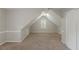 Spacious bedroom featuring neutral carpet, and a window offering natural light at 901 Chadwick Park Dr, Lawrenceville, GA 30045