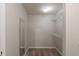 Walk-in closet with neutral carpet, one full length mirror, and shelving at 901 Chadwick Park Dr, Lawrenceville, GA 30045