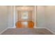 Dining room featuring hardwood floors, decorative columns, and chandelier at 901 Chadwick Park Dr, Lawrenceville, GA 30045