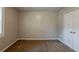 Bedroom showing a closet, window with natural light, and neutral walls at 2245 Dauphine St, Atlanta, GA 30344