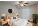 Comfortable bedroom with neutral tones, closet, and ceiling fan at 2245 Dauphine St, Atlanta, GA 30344