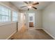 A bedroom features neutral walls, carpet and access to an ensuite bathroom at 2245 Dauphine St, Atlanta, GA 30344