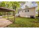 Charming single-story home with a well-maintained lawn and covered parking at 2245 Dauphine St, Atlanta, GA 30344