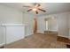 A comfortable living room features neutral walls, carpet, and a fireplace at 2245 Dauphine St, Atlanta, GA 30344