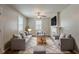 Inviting living room featuring a fireplace, plush seating, and ample natural light at 2245 Dauphine St, Atlanta, GA 30344